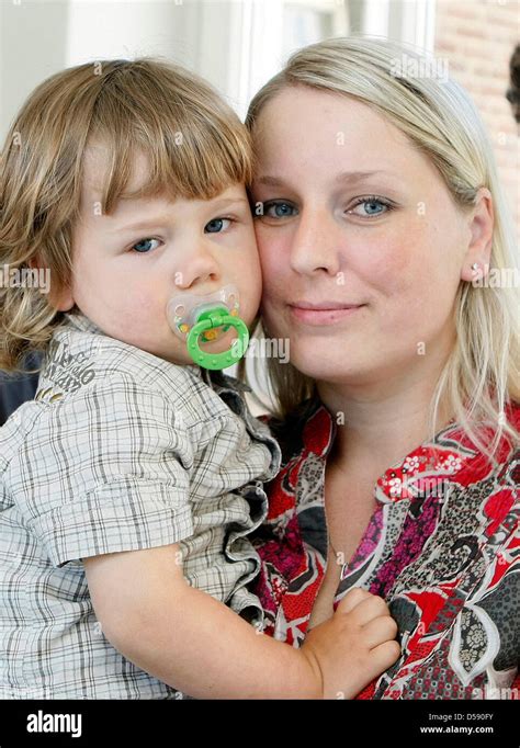 Monika Placek Poses With Her Two Year Old Son Cyprian In The Clinical