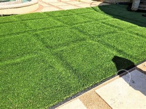 Laying artificial grass is a simple way to brighten up your garden all year round. Pin on New home ideas