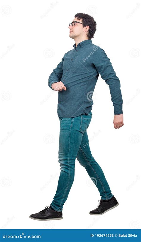Full Length Side View Of Young Businessman Confident Walking Isolated