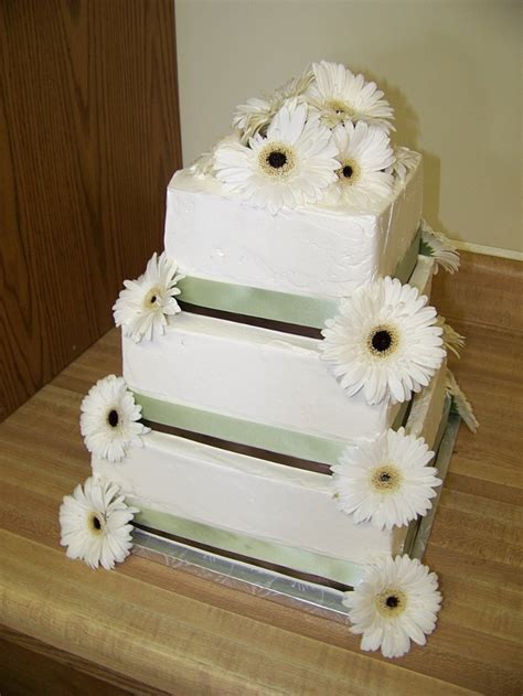 Square Wedding Cake With Sage Green And Brown Ribbon And Fresh White