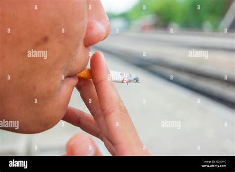 Man Smoking Cigarette Stock Photo Alamy