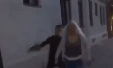 Shocking Moment Brutal Thug Sucker Punches Woman On A Swedish Street