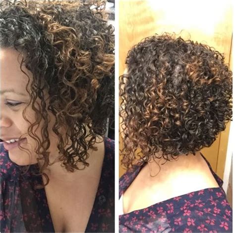 We are a creative team of hair maniacs who can't live a day without surfing the internet in search of new hairstyles and haircuts, stunning hair shades. Curly hair - Angled Bob Haircut | NaturallyCurly.com