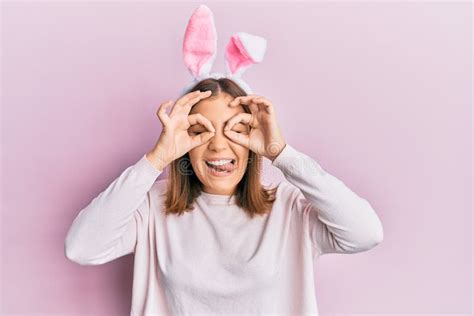 Young Beautiful Woman Wearing Cute Easter Bunny Ears Doing Ok Gesture