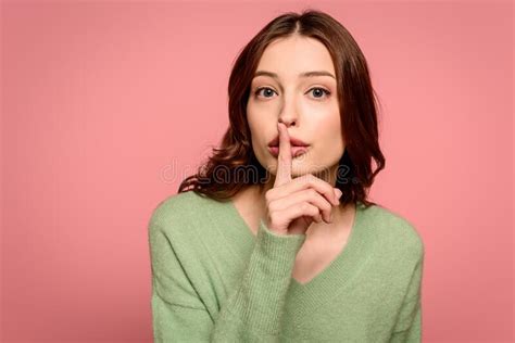 Girl Showing Hush Gesture While Looking Stock Image Image Of Curly