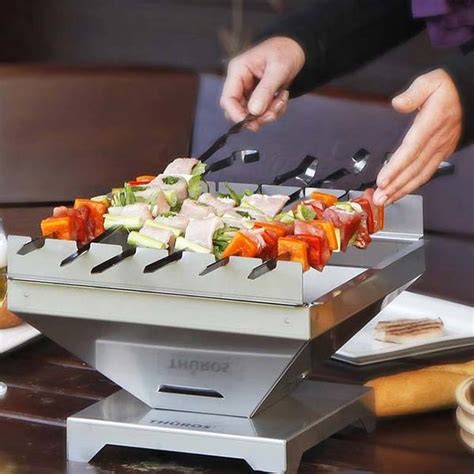 Dazza has a passion for barbequing. Thuros Tabletop Portable BBQ Grill Lets You Barbecue with ...