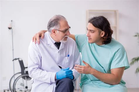 Young Male Patient Visiting Experienced Doctor Stock Image Image Of