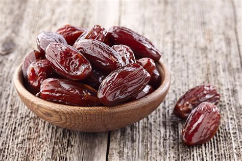 Dates Fruit On A Wooden Background The Pulse