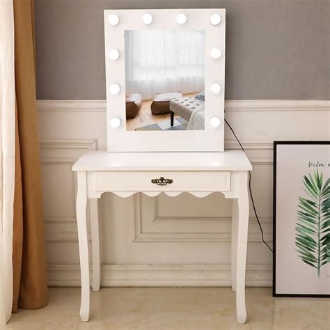 A vanity mirror with lights is the perfect thing that you can add to your bathroom or bedroom. UBesGoo Modern Vanity Table with Lighted Mirror, Makeup ...