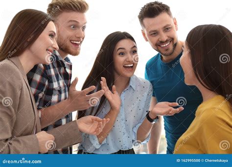 Group Of Happy People Talking In Room Stock Photo Image Of Friends