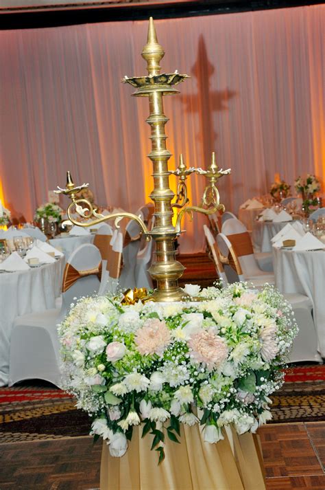 The Traditional Oil Lamp Decorated With Flowers At Ayanthi S And Asela S Wedding At The Oak Room