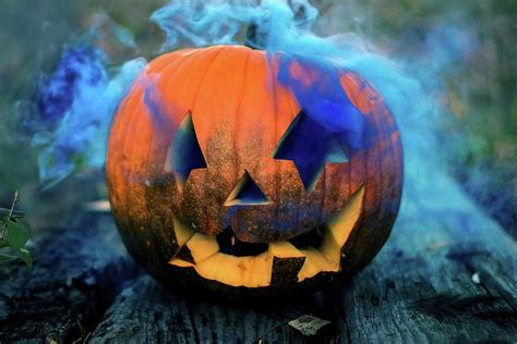 A Halloween Pumpkin Head With Smoke Photograph By Cavan Images Pixels