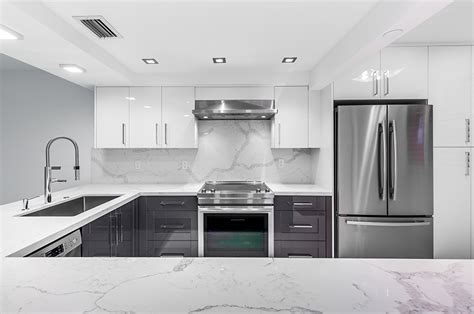 Give this idea a shot. Slick and clean Kitchen design with Calacatta quartz ...