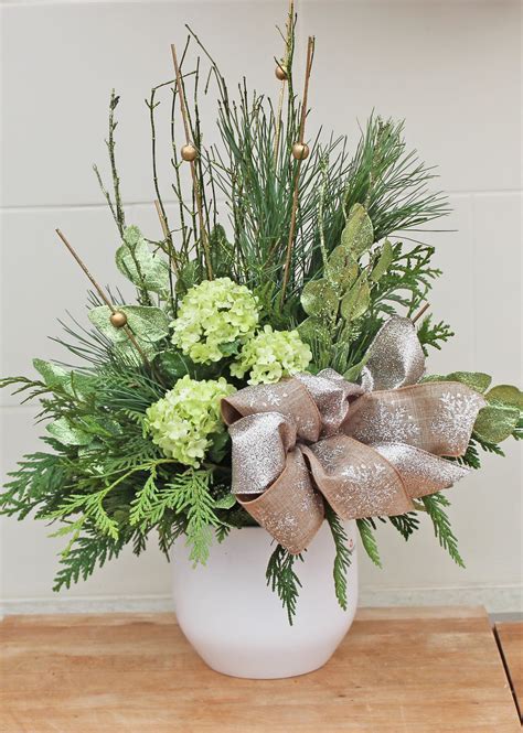 Indoor Evergreen Arrangement For The Christmas Season Christmas Pots