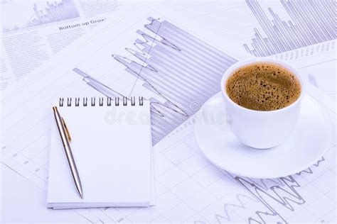 Cup Of Coffee Notepad And Graphs Stock Image Image Of Notepad