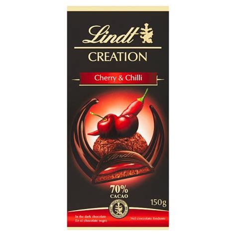 Now trim the second sponge round like the first one, and fit it snugly into the cake, over the mousse. Lindt Creation 70% Dark Chocolate Filled with Chocolate ...