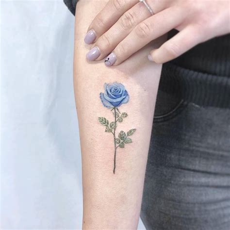 Blue Rose Tattoo On The Inner Forearm