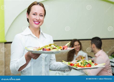 Waitress Serving Food To Visitors Stock Photo Image Of Prepared