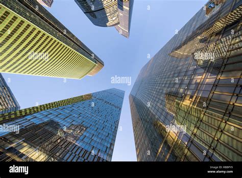perspective bottom up view on business district skyscrapers Stock Photo
