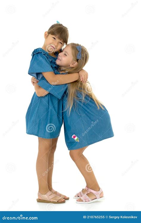 Two Happy Girls Hugging Each Other Stock Image Image Of Beauty Dress 210765255