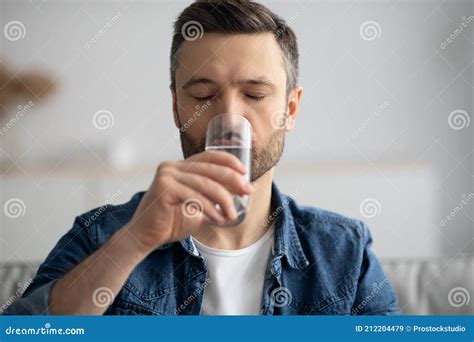 Closeup Of Middle Aged Man Drinking Water At Home Stock Image Image Of Drinking Middleaged