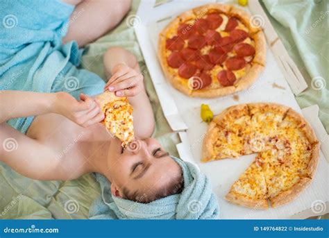 Cute Girl With A Towel On Her Head Eats Pizza In Bed Young Woman Eating Pizza In Bed Life Is A
