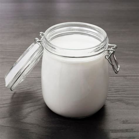 Free Photo Opened Jar With Fresh Milk