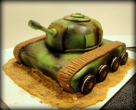 Camouflage themed big cake little cakes… chocolate mud layer cake with vanilla cupcakes for a soldier's 40th birthday celebration. Confections: Army Tank