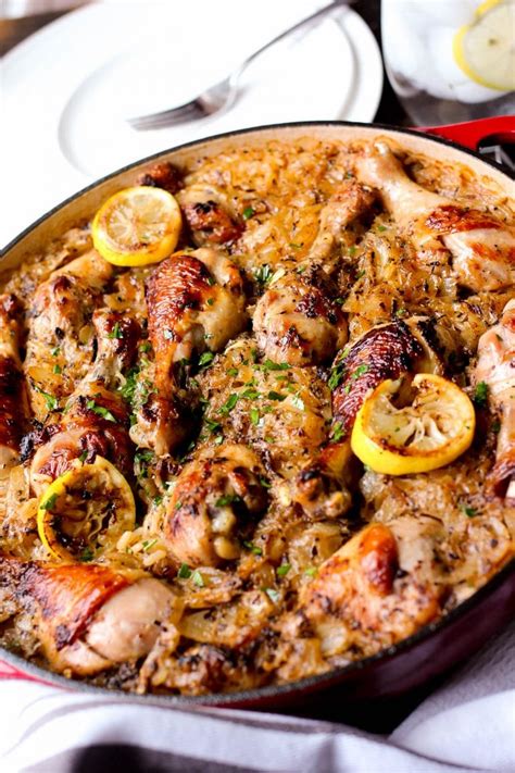 Today we're talking about a greek chicken skillet that's all that and checks two additional boxes: One Pot Roasted Greek Chicken and Rice - Girl and the Kitchen