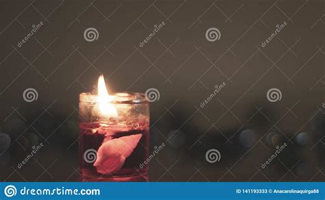 Candle With Marine Objects Inside Soft And Dim Light Elegance And