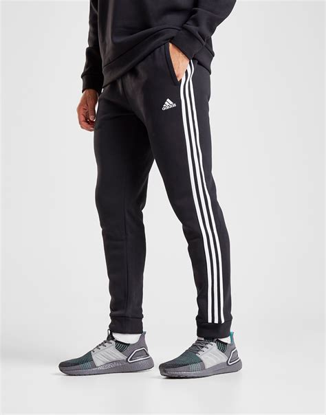 Buy Black Adidas Essentials 3 Stripes Track Pants Jd Sports Jd