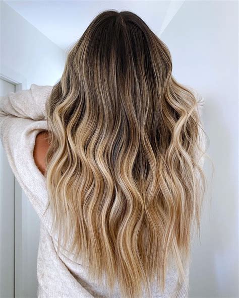 reverse balayage is the coolest new hair color trend for blondes honey blonde hair color