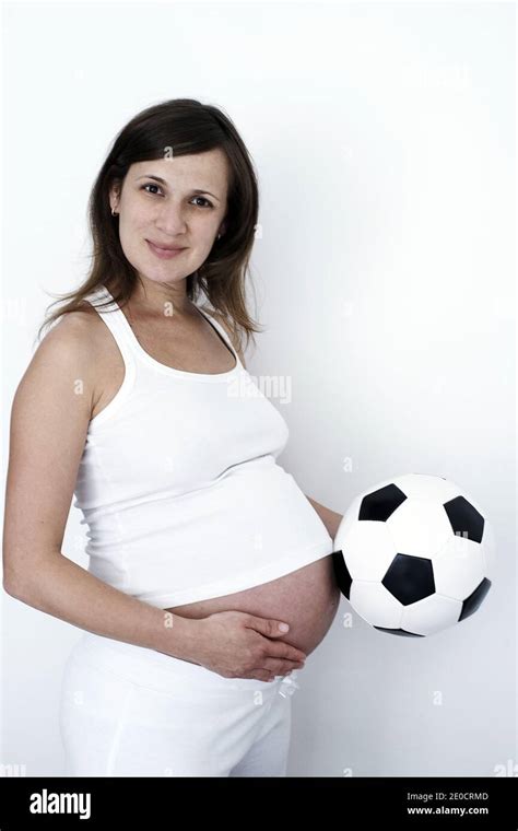 Great Britain England London Pregnant Woman With Soccerball Stock