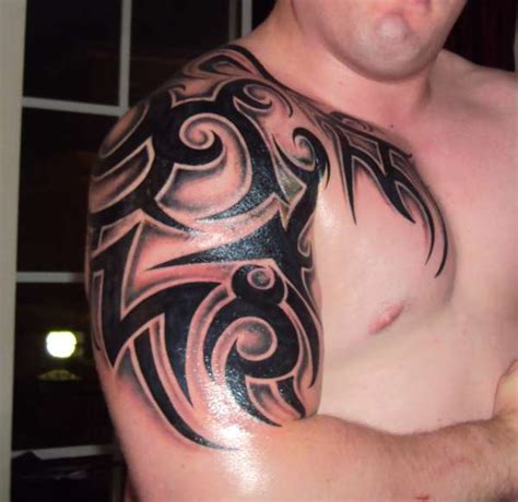 Awesome Tribal Chest And Sleeve Tattoo Fresh Tattoo Ideas
