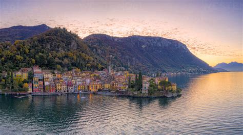Aerial View Of Autumn Sunrise Over Varenna Old Town On Shores Of Lake