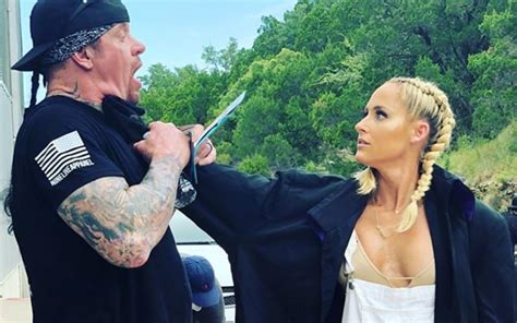 Michelle Mccool Channels The Undertaker And Chokes Him After Putting On