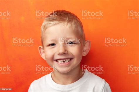 Studio Portrait Of A 4 Year Old Baby Boy Stock Photo Download Image