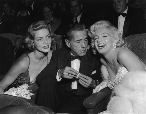 Lauren Bacall Humphrey Bogart And Marilyn Monroe At The Premiere Of