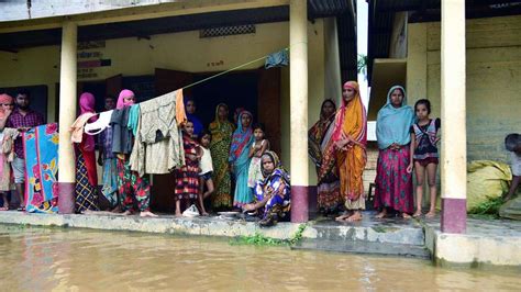 Pictures How Floods Have Disrupted Normal Life In Assam And Bihar
