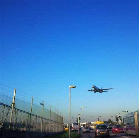 A Plane Landing At London Heathrow Airport London England Heathrow