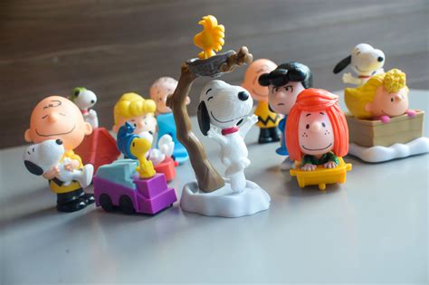 Kids now can get one of 10 toys with happy meal. First look: Snoopy, Charlie Brown, Peanuts characters are ...