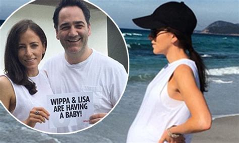 Pregnant Lisa Wipfli Shows Off Her Bump In Tight Tank Top On The Beach