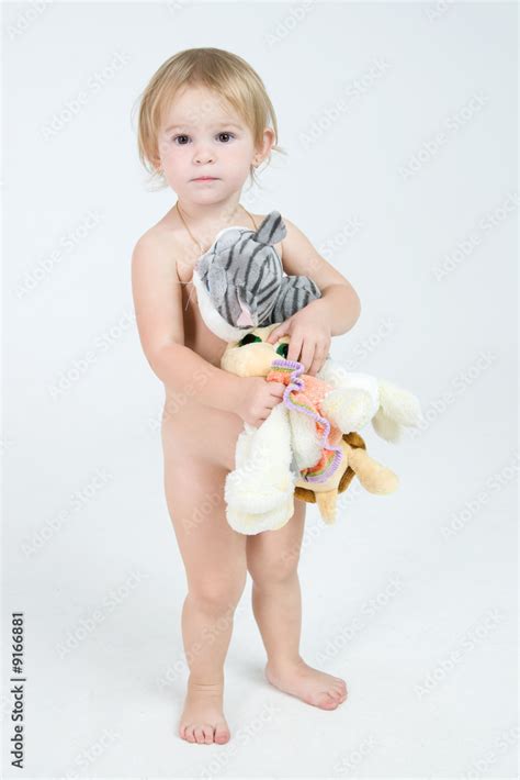Babe Naked Girl Is Staing With A Toys Stock Photo Adobe Stock