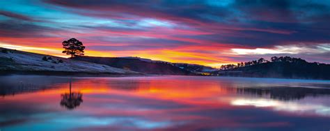 Download Wallpaper 2560x1024 Lake Reflections Sunset Clouds Nature
