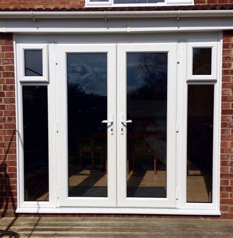 Wide French Doors With Side Panels Featuring Opening Windows Kitchen