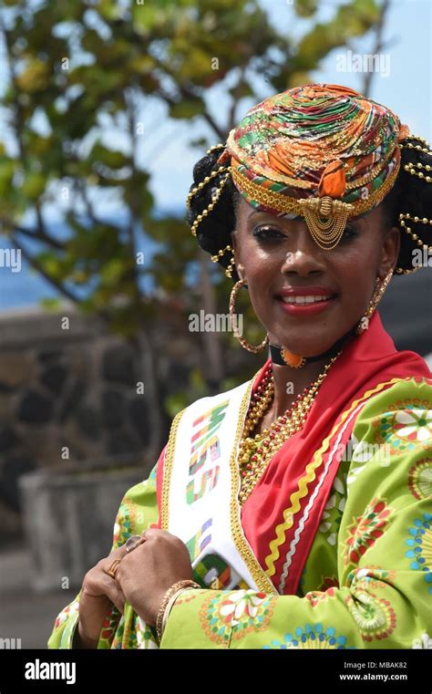 Carnival In The Caribbean Island Of Dominica Women In National Costume