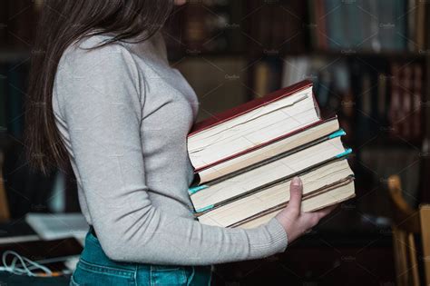 Student Girl Holding Books High Quality Education Stock Photos