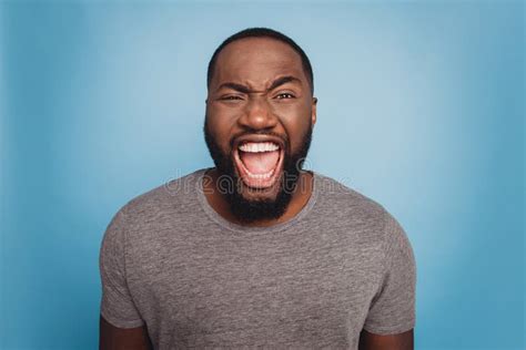 Angry Irritated Young African Man Screaming Looking Camera Isolated On