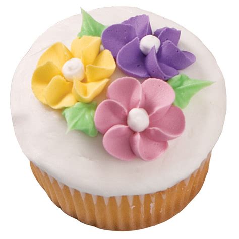 Made using specialty decorating tip 81, these cupcakes are simple enough for beginners and are great for summer. Drop Flower Extravaganza Cupcake | Wilton