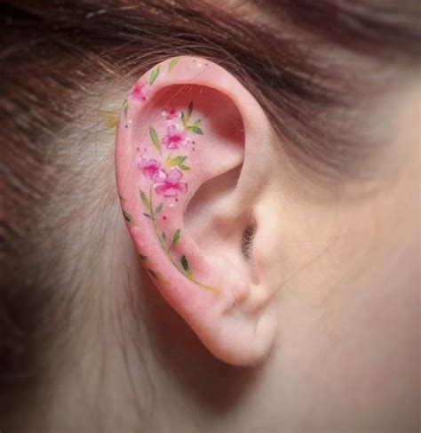 Tiny Flower Ear Tattoo Ear Tattoo Cool Tattoos Tiny Flowers
